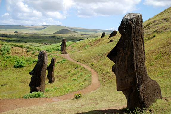 Flank of Rano Raraku crater, with smattering of standing Moai